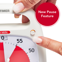 A close up image of the Time Timer PLUS visual timer highlighting the PAUSE button. A hand is about to press the button which is shown popped out with an orange rim.  