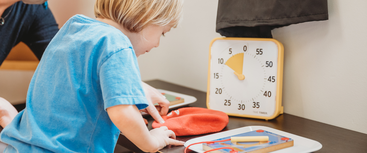Child Using Timer How Can I Help a Child with Autism Understand the Concept of Time ...