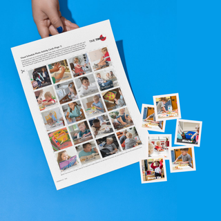 Sheet of printed photos with cut-out images on a blue background