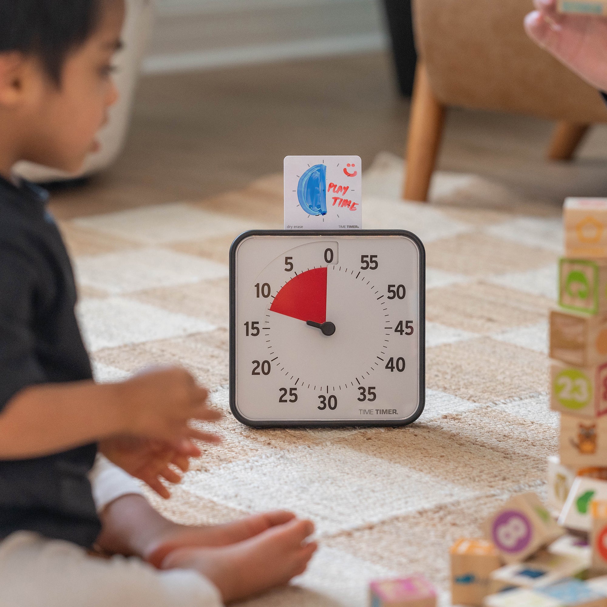 The Timer Timer Original 8" is shown with the 3x3 card on top. A half disk is drawn in blue with the words "Play Time" and a smiley doodle written in red. 