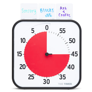 The Time Timer Original 12" is shown with three Dry Erase Activity Cards slotted into the top of the timer. The first one says "Sensory," the second says "Blocks", and the third says "Arts & Crafts."