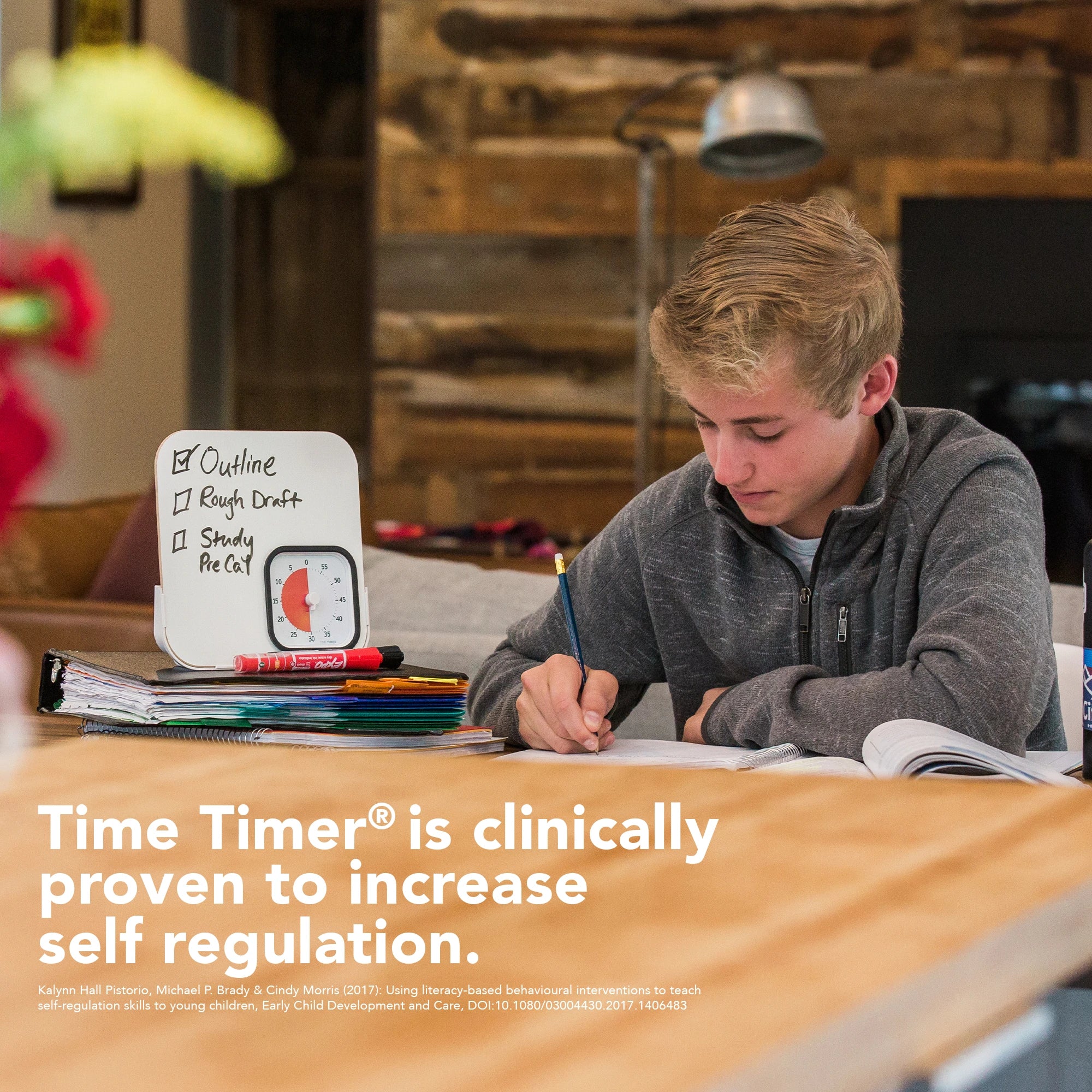 Time Timer® Dry Erase Board helping a teenage boy study
